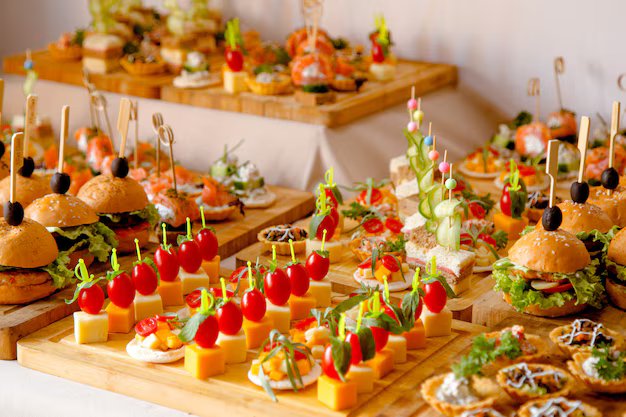 86675buffet-table-with-snacks-from-burgers-cheeses-etc_140725-9343.jpg